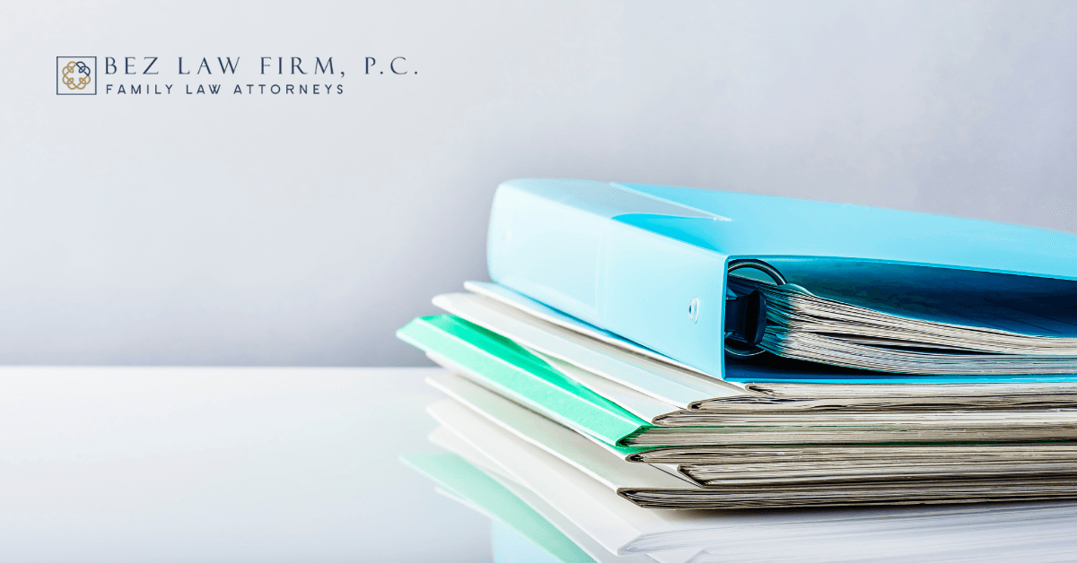 Image of binders and folders on a desk