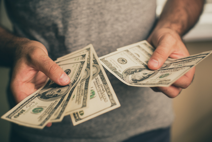 person counting money